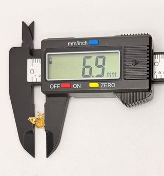 Pendiente Manzanas de oro de 18k, 1.41 g.