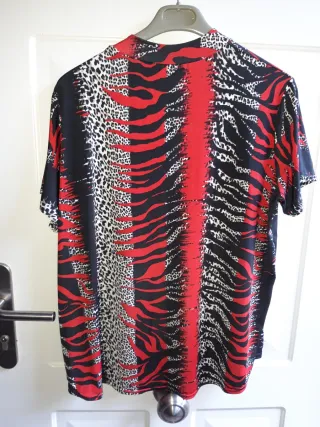 Blusa de licra fría con estampado animal print
