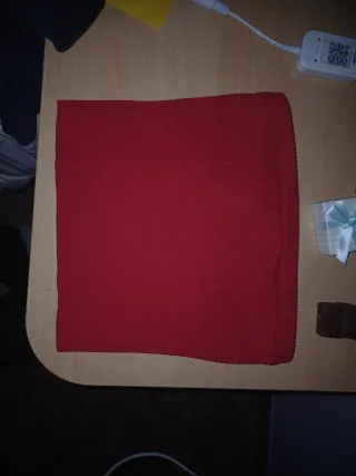 Top rojo de tejido acanalado