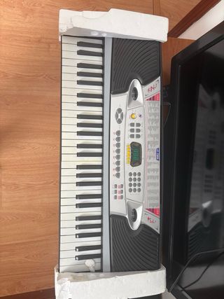 Piano Eléctrico 54 Teclas + Micrófono