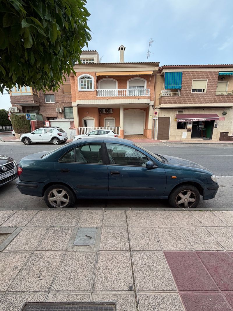 Nissan Almera 2002 - foto 1