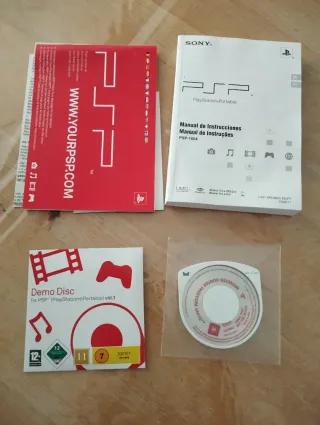 Sony PSP-1004 Negra con caja y accesorios