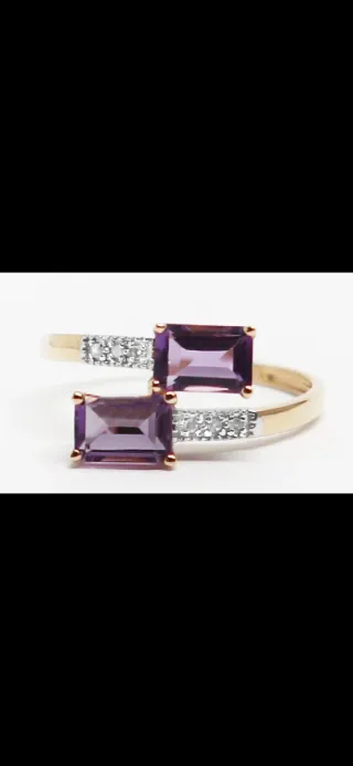 Anillo de oro 14cts con Amatista y diamantes.