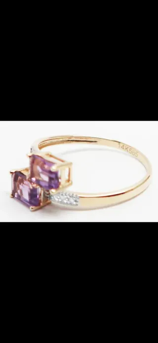 Anillo de oro 14cts con Amatista y diamantes.