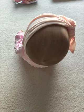 Muñeca bebé realista con accesorios