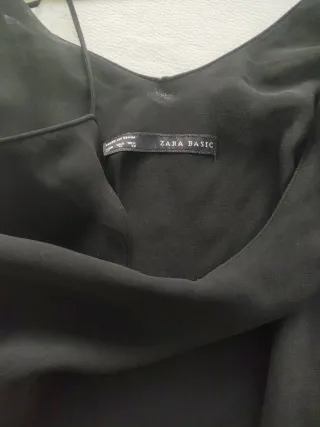 Blusa floral con top negro