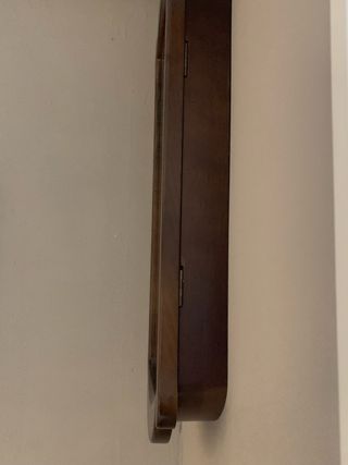 Reloj de pared antiguo con péndulo