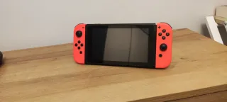 Nintendo Switch Roja Completa + fundas transporte