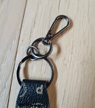 Portachiavi Pollini nero e oro unisex