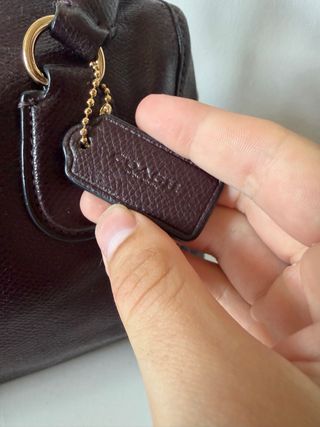 Coach leather handbag in burgundy