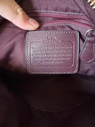 Coach leather handbag in burgundy