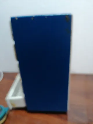 Armario de madera para muñecas Nancy