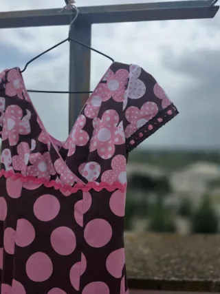 Traje de flamenca con lunares y flores