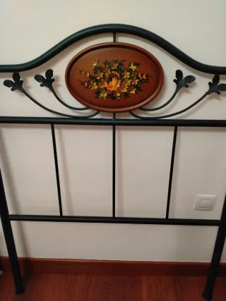 Cabezal de forja con detalle floral