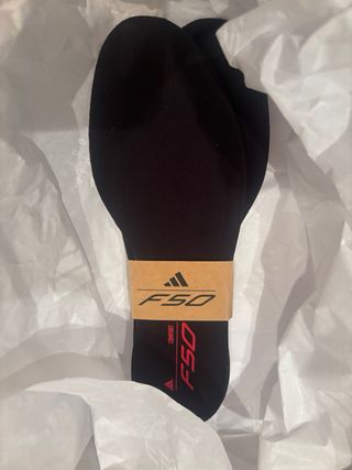 Botas de fútbol Adidas blancas y amarillas