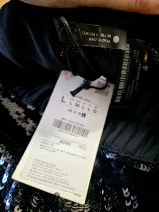 Pantalón ZARA lentejuelas negro de fiesta