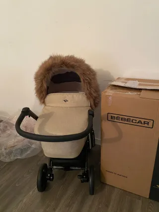 Carrito bebecar beige con capota de pelo