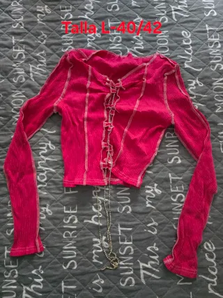 Chaleco rosa con cordones