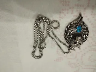 Collana con pendente lupo e pietra blu