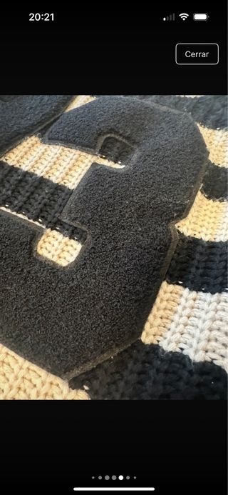 Jersey rayas beige y negro con número 73