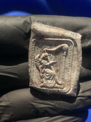 Sello tipo antiguo réplica plomo ángel arpa