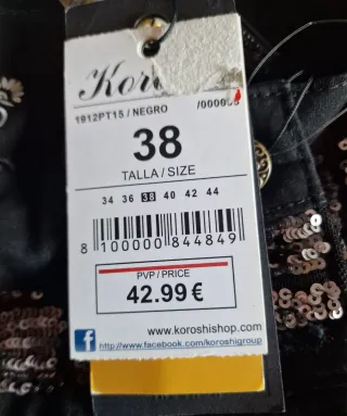 Pantalón bombacho negro con brillos