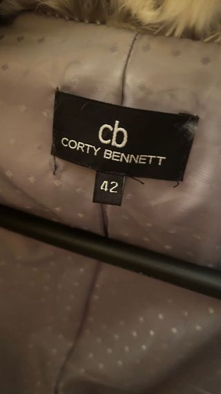 Chaquetón de piel de pelo beige y gris