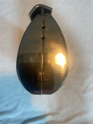 Bolso de mano metálico dorado tipo clutch