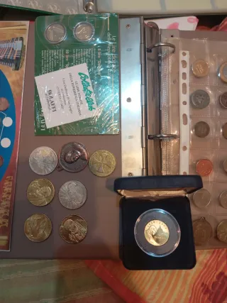 Fogli per monete + monete