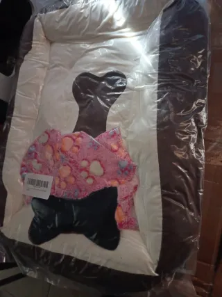 Cama cuna para perros beige y marrón