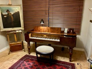 Antiguo piano de caoba