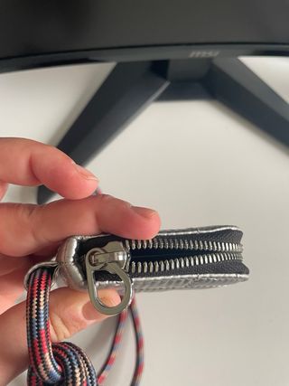 Cartera colgante Tous plateada y negra