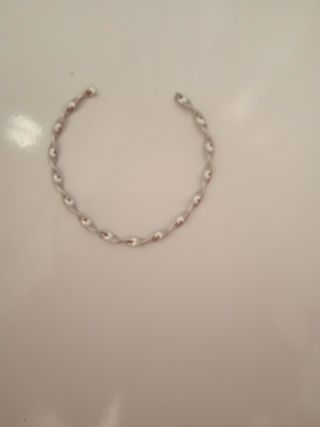 Pulsera plateada trenzada