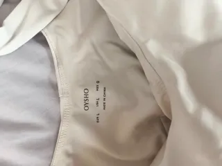 Prenda deportiva blanca talla L con malla