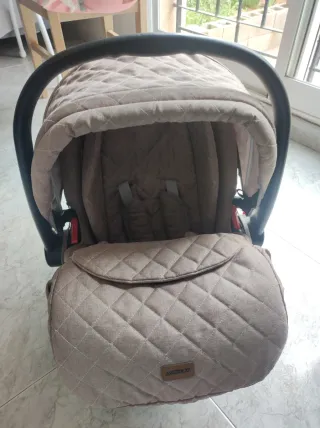 Carrito, capazo, bañera y portabebés