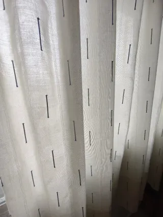 Cortinas blancas con detalles