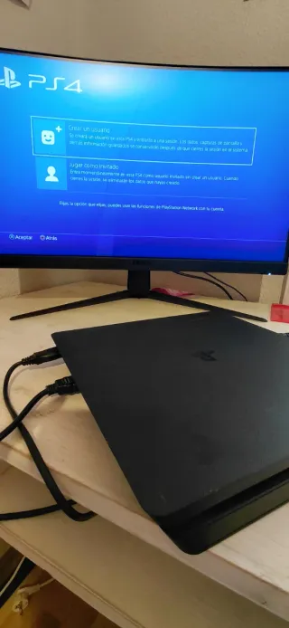 PS4 (PlayStation 4) con 2 mandos y caja