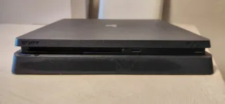 PS4 (PlayStation 4) con 2 mandos y caja