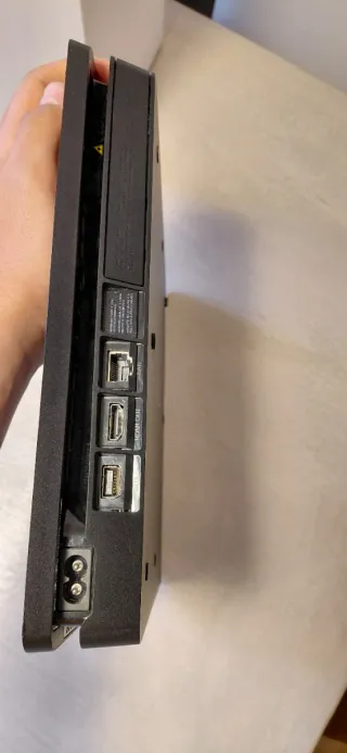 PS4 (PlayStation 4) con 2 mandos y caja