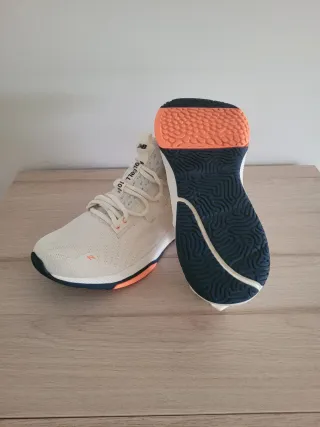 Zapatillas New Balance Blancas y Naranja