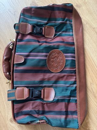 Mochila de cuero y tela a rayas