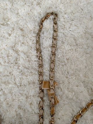 Cinturón cadena con lazo beige y dorado