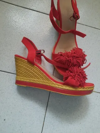 Sandalias Andaríña Rojas con Flecos