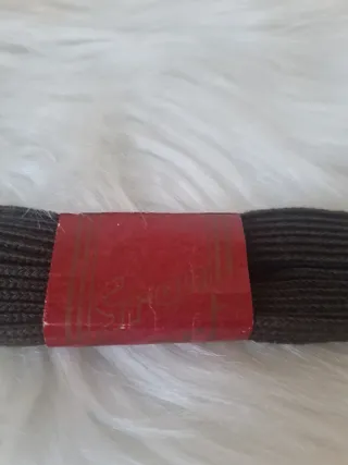 Stringhe piatte marrone scuro