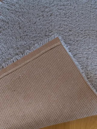 Alfombra gris para dormitorio
