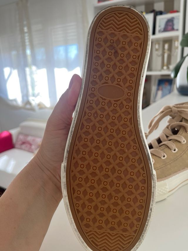 Zapatillas altas doradas