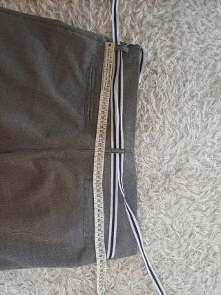 Pantaloni grigi con laccetti in vita