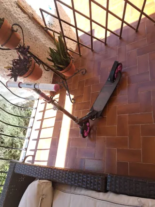 Patinete Oxelo rosa y negro