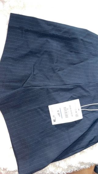 Falda pantalón gris con rayas