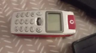 Móvil Alcatel Rojo y Plateado